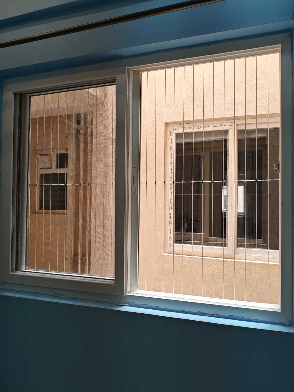 Window Invisible Grills — photo 14 installation in BTM Layout — real project photo by Jogi Invisible Grills